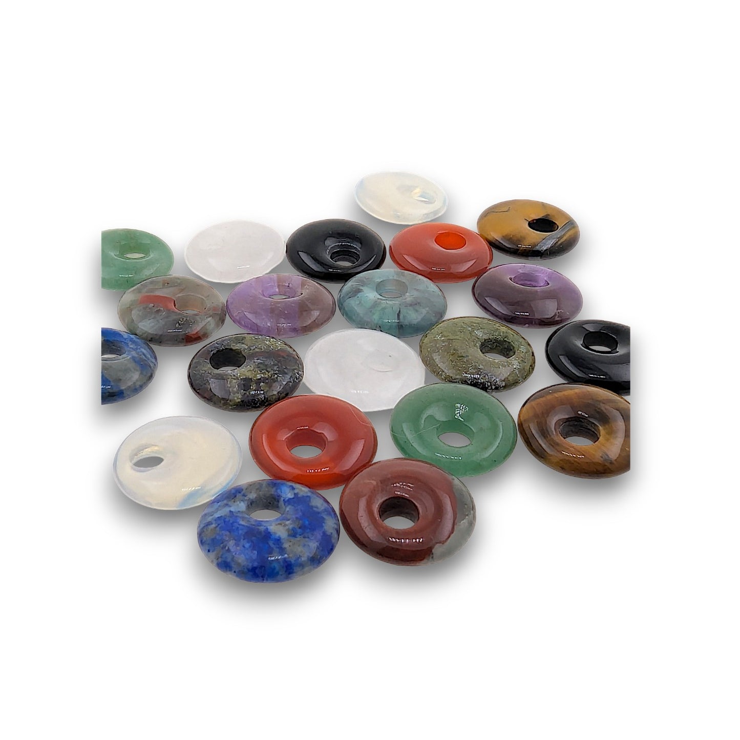 Small Gemstone Donuts - Pack of 20. Pack of 20 assorted natural Gemstone Donuts, each approximately 20mm in diameter.
