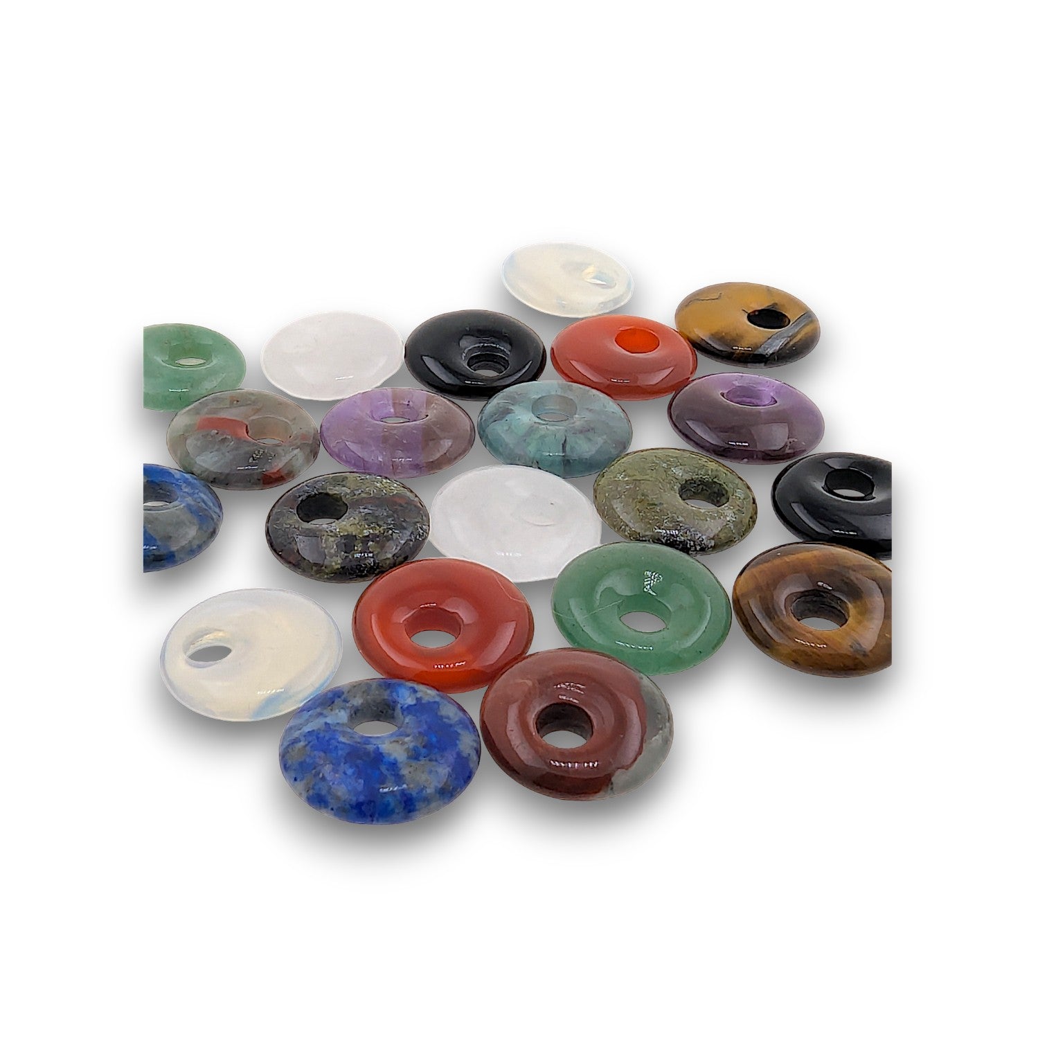 Small Gemstone Donuts - Pack of 20. Pack of 20 assorted natural Gemstone Donuts, each approximately 20mm in diameter.