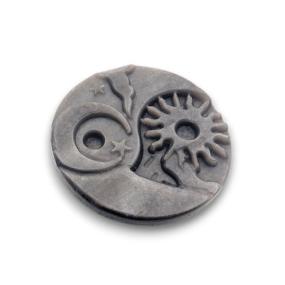 Obsidian Sun and Moon Carving