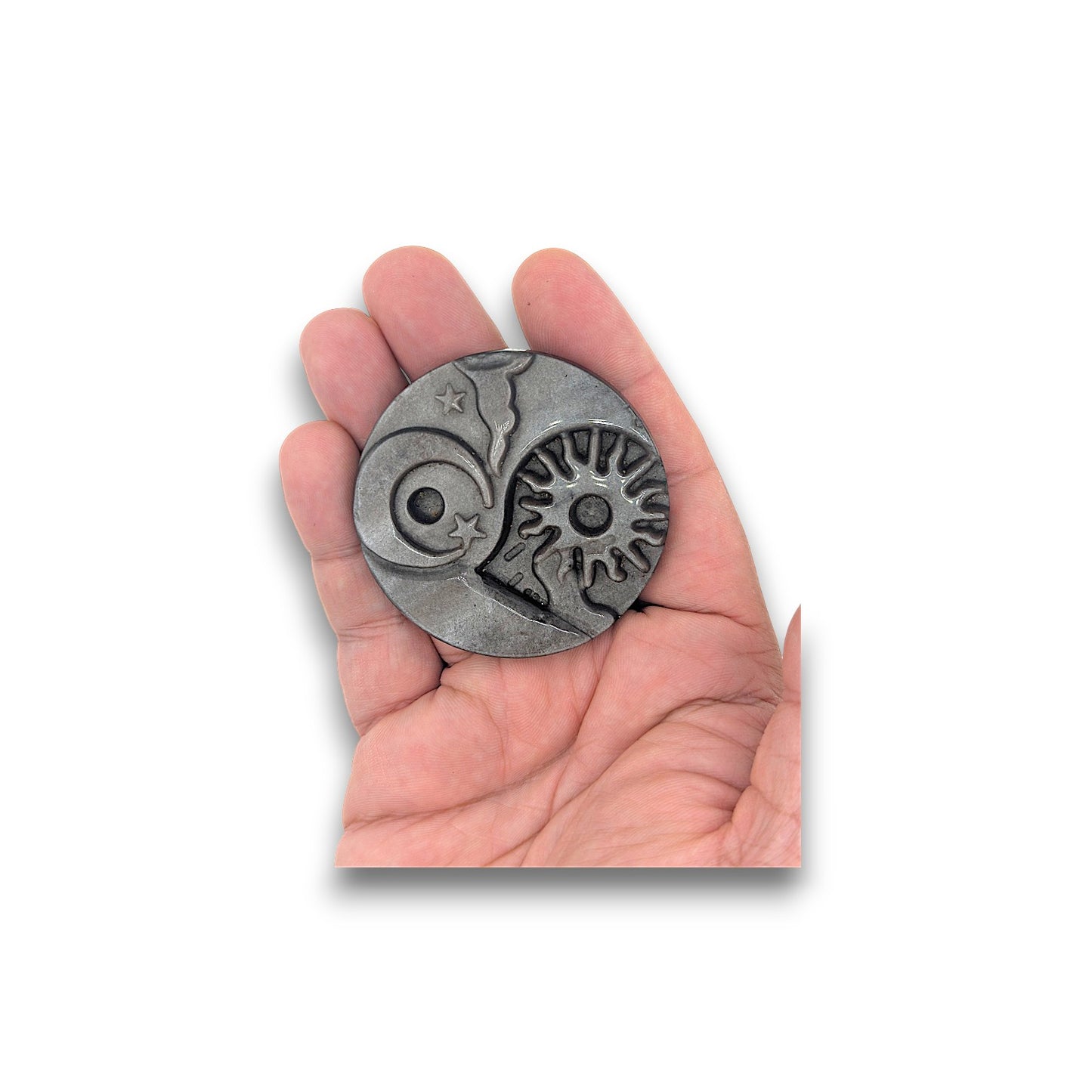Obsidian Sun and Moon Carving
